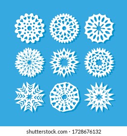 Vector Hand Made Snowflakes Cut From White Paper On A Blue Background 9 Pieces