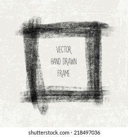 Vector hand painted grungy square frame on beige weathered background