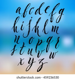 Vector hand written brush pen script. Hand drawn calligraphic latin alphabet. Cute isolated letters on an abstract background.