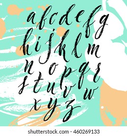 Vector hand written brush pen script. Hand drawn calligraphic latin alphabet. Cute isolated letters on an abstract background.
