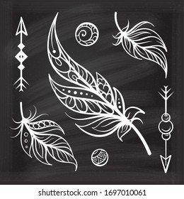 Vector hand-drawn boho style elements set on a chalkboard background