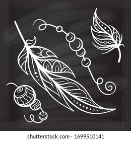 Vector hand-drawn boho style elements set on a chalkboard background