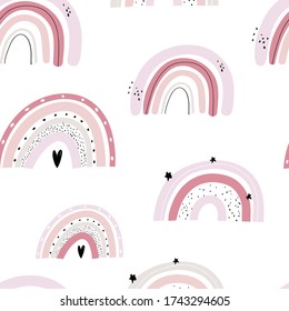 Vector hand-drawn color seamless childish simple pattern for kids with cute rainbows in Scandinavian style on a white background. Baby pattern with rainbows. Fabric design. Wallpaper.
