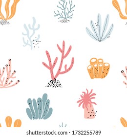 Vector hand-drawn colored childish seamless repeating simple flat pattern with algae and corral in Scandinavian style on a white background.Pattern for children with corral.Sea ocean.Underwater plants
