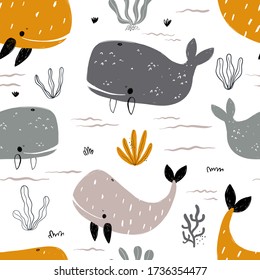 Vector hand-drawn colored childish seamless repeating simple flat pattern with whales in scandinavian style on a white background. Cute baby animals. Pattern for kids with whales. Sea. Ocean.
