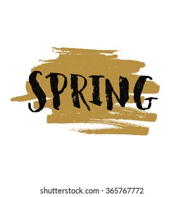 Vector handdrawn lettering Spring on gold brush stroke with grunge texture. Spring sign on gold paint stain
