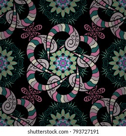 Vector hand-drawn mandala, colored abstract pattern on a black, neutral and blue colors.