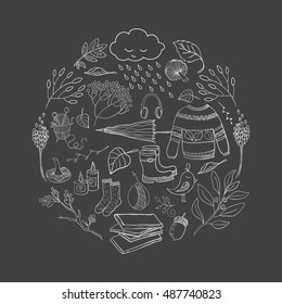 Vector handdrawn outline autumn elements made in circle isolated on blackboard. Vector illustration.
