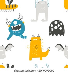 Vector hand-drawn seamless childish pattern with cute funny monsters on a white background. Alien. Kids texture for fabric, wrapping, textile, wallpaper, apparel. Scandinavian design. Illustration.