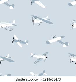 Vector hand-drawn seamless repeating children simple pattern with aircraft in Scandinavian style on a blue background.Kids seamless pattern with planes. Funny airplanes. Trendy vector background.