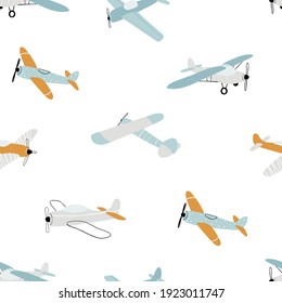 Vector hand-drawn seamless repeating children simple pattern with aircraft in Scandinavian style on a white background.Kids seamless pattern with planes. Funny airplanes. Trendy vector background.