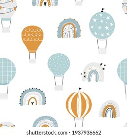 Vector hand-drawn seamless repeating children simple pattern with air balloons and rainbows in Scandinavian style on a white background. Kids pattern with air balloons. Funny transport. Aircraft.