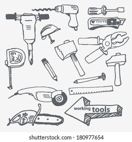 Vector hand-drawn working tools set on paper illustration