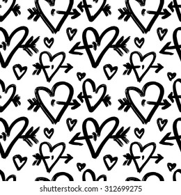 Vector hand-painted seamless pattern with ink hearts. Abstract background. Doodles.
