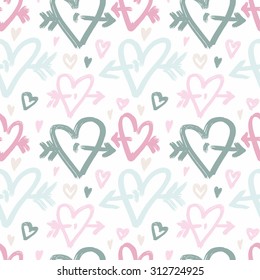Vector hand-painted seamless pattern with ink hearts. Abstract background. Doodles.