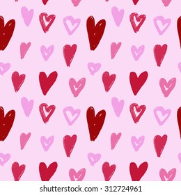 Vector hand-painted seamless pattern with ink hearts. Abstract background. Doodles.