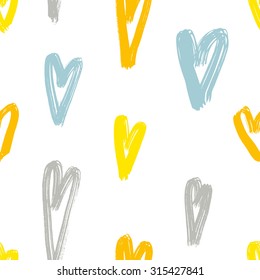 Vector hand-painted seamless pattern with ink hearts. Abstract background. Doodles.