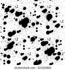 Vector hand-painted seamless pattern with ink dots and splats. Abstract background.