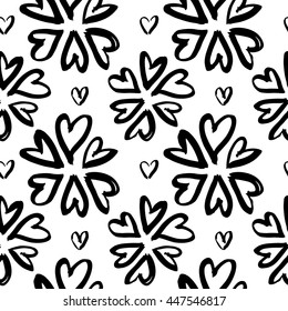 Vector hand-painted seamless pattern with ink hearts. Abstract background. Doodles.
