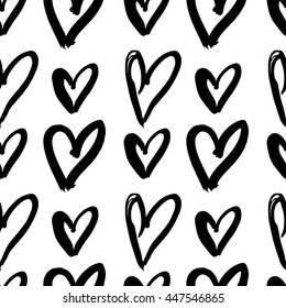 Vector hand-painted seamless pattern with ink hearts. Abstract background. Doodles.

