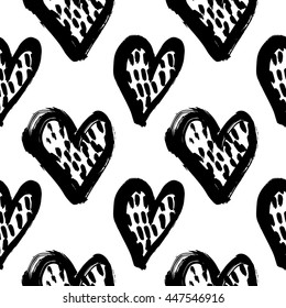 Vector hand-painted seamless pattern with ink hearts. Abstract background. Doodles.
