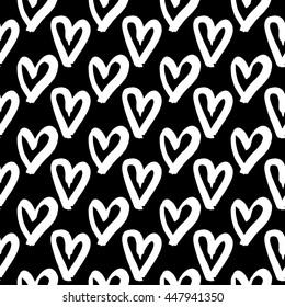 Vector hand-painted seamless pattern with ink hearts. Abstract background. Doodles.
