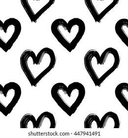 Vector hand-painted seamless pattern with ink hearts. Abstract background. Doodles.
