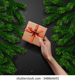 Vector hands holding gift  box in hand background  Christmas Greeting Card 