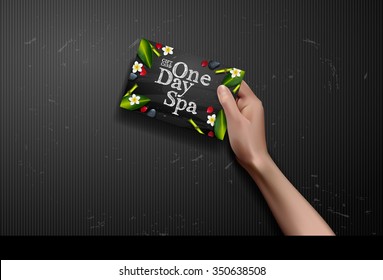 Vector hands holding gift voucher. spa day card in hand background 