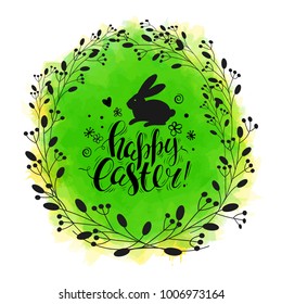 Vector handwritten inscription Happy Easter and bunny. Template for card. Brush lettering. Modern ink calligraphy. Green watercolor background. Vintage floral wreath.