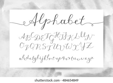 vector handwritten lettering alphabet, calligraphic font on watercolor texture