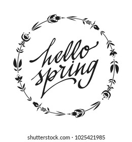 Vector handwritten lettering "Hello spring" inside the flower wreath.