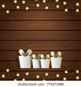 Vector happy new year poster. Cutout paper gift boxes on wooden background with lights. Festive christmas decorations. Paper stickers. Template with space for your design. Craft and rustic style. 