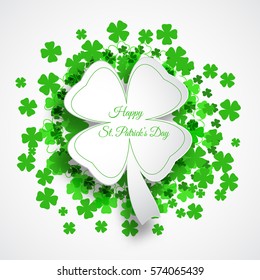 Vector Happy St. Patrick's Day poster on the white background with green leaf of clover shape cut from paper, text and clover leaves arranged in a circle.