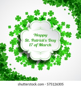 Vector Happy St. Patrick's Day card on the white background with label cut from paper, shadow, text and clover leaves arranged in a circle and at corners.