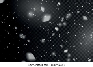 Vector heavy snowfall, snowflakes in various shapes and forms. Snowy background. White snowflakes fly in the air. White snow flies on transparent background. Christmas snow.
