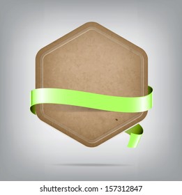 Vector hexagonal old paper cardboard banner with green silky ribbon