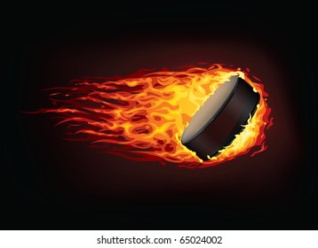 Vector hockey puck in enveloped in fire flames isolated on black background. 
