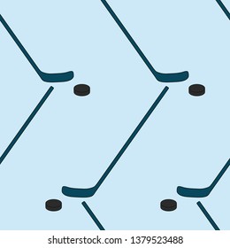 Vector hockey sticks and pucks seamless pattern