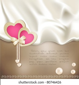 vector holiday background with beige silk, with two pink hearts and pearls