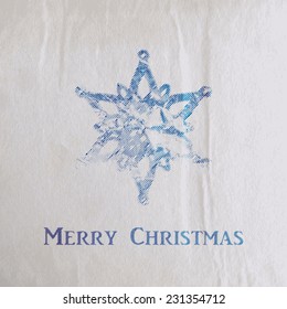 vector holiday illustration of engraving Christmas snowflake on the old wrinkled paper background. Merry Christmas and Happy New Year. greeting card or banner template