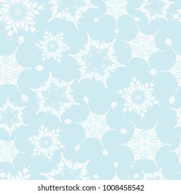 Vector holiday light blue hand drawn christmass snowflakes repeat seamless pattern background. Can be used for fabric, wallpaper, stationery, packaging.