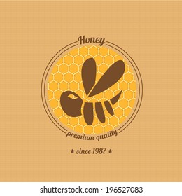 vector honey bee icon on honeycomb background. abstract bee silhouette. honey vintage label or sticker