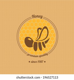 vector honey bee icon on honeycomb background. abstract bee silhouette. honey vintage label or sticker