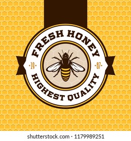 Vector honey logo with bee on a honeycomb background.