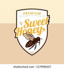 Vector honey logo with bee on a honeycomb background.