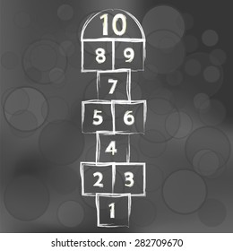 Vector Hopscotch Game on Dark Blurred Background. Symbol of Childhood. Popular Children Game