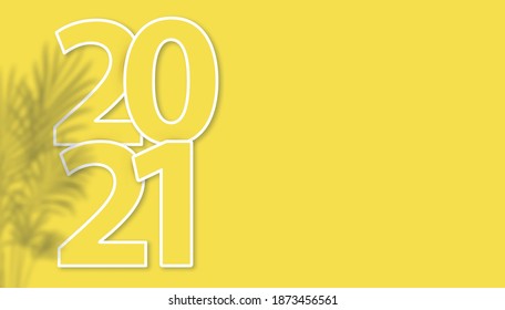 Vector horizontal banner for Happy New Year 2021 on illuminating yellow background. Bright yellow date 2021 with palm leaves shadow and copy space. Modern Christmas minimal design, header, poster.