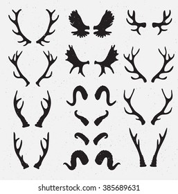 Vector Horns set silhouette on the grunge hipster background. Grunge effect isolated.