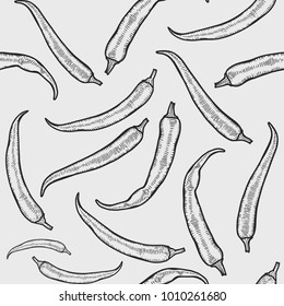 Vector hot chili peppers seamless pattern. Vintage engraving hand drawn illustration. Hot spicy mexican food.